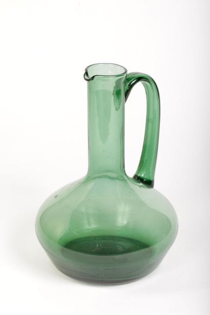 Green-tinted glass carafe 
Probably Italian,...