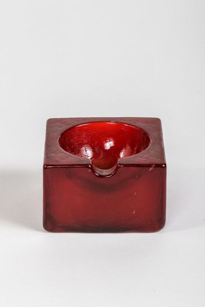 Reddish-brown molded glass square ashtray...