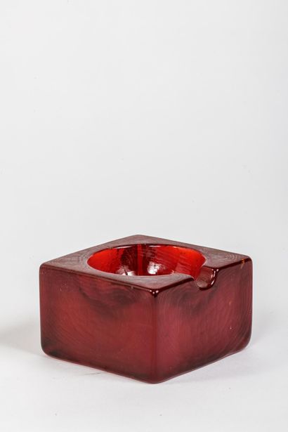 Reddish-brown molded glass square ashtray...