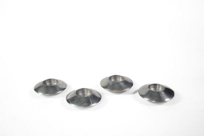 Four Space Age candleholders shaped like...