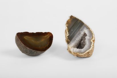 Two geodes that can be used as paperweights,...