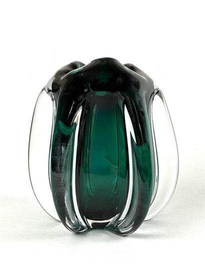 Free-form glass vase in shades of emerald
16...