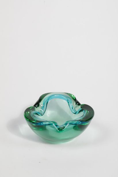 Free-form molded glass ashtray in shades...
