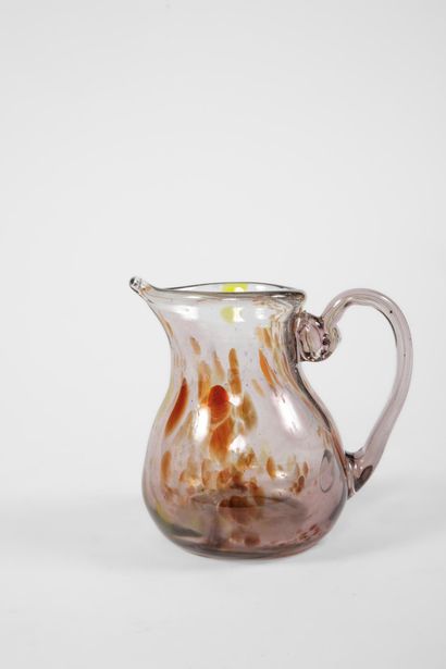 Small multicolored speckled blown glass pitcher...