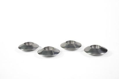 Four Space Age candleholders shaped like...