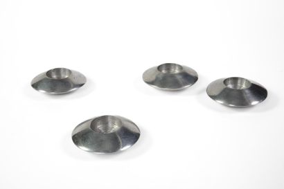 Four Space Age candleholders shaped like...