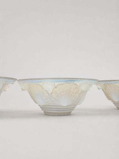 Set of four opalescent pressed-and-molded...