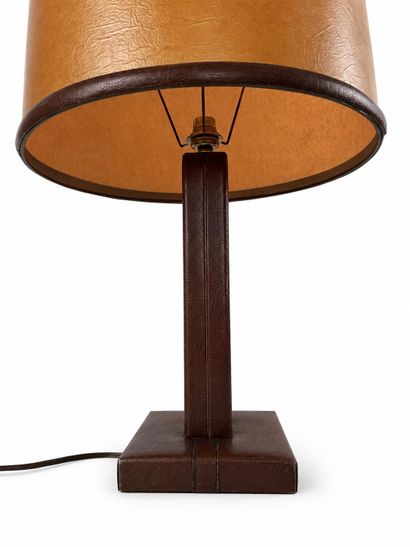 In the style of Jacques Adnet (1900–1984)
Le...