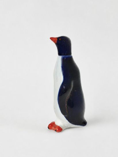 Cruche Pingouin en faïence émaillée polychrome
Travail...