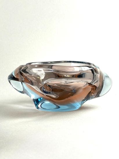 Free-form glass vase in shades of emerald
16...