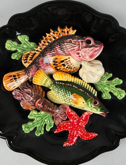 In the style of VALLAURIS,
Polychrome glazed...