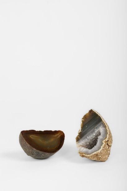 Two geodes that can be used as paperweights,...