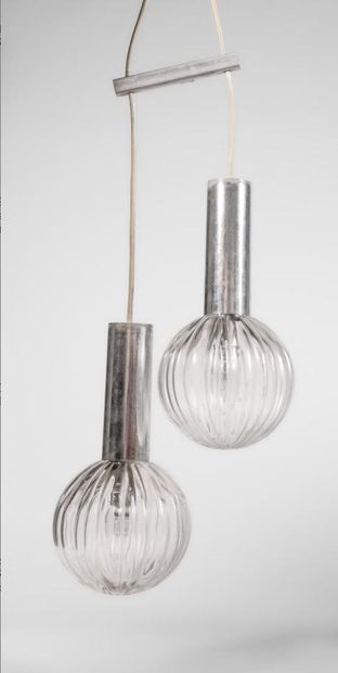A pair of double-cascade pendant lights made...