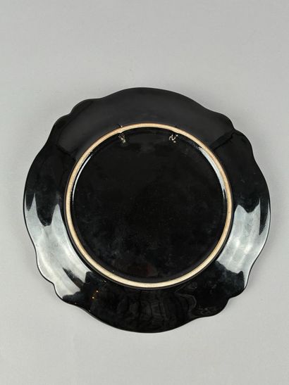 In the style of VALLAURIS,
Polychrome glazed...