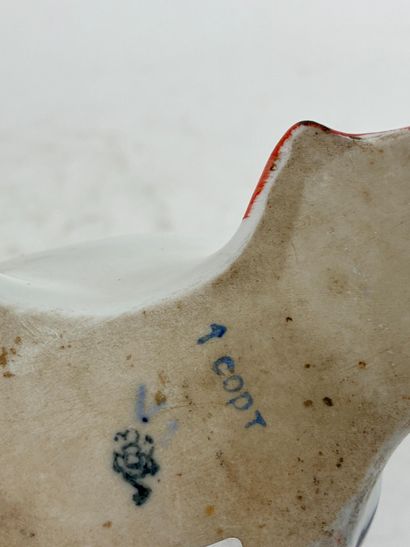 Cruche Pingouin en faïence émaillée polychrome
Travail...