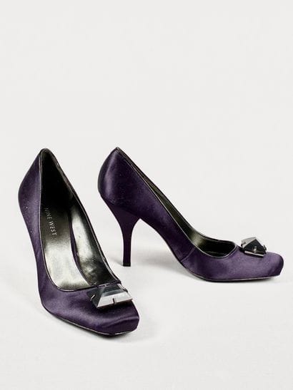 NINE WEST 
Pair of purple satin pumps with...