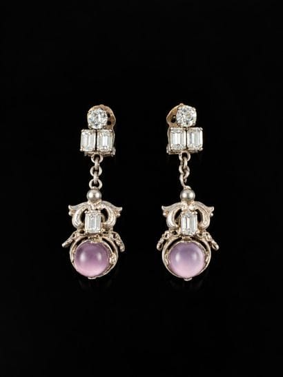 Pair of silver plated dangling ear clips...