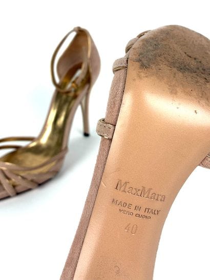 MAX MARA
Powder pink and gold nubuck clutch...