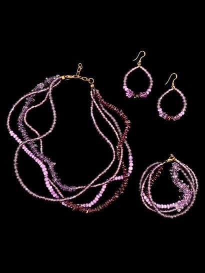 A set of purple stones and amethysts, including...