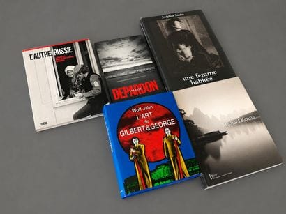 A set of five books on photography. 
Raymond...