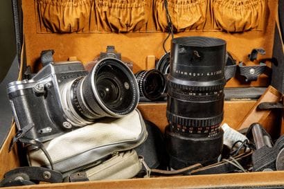 In a suitcase, a set of photographic equipment....