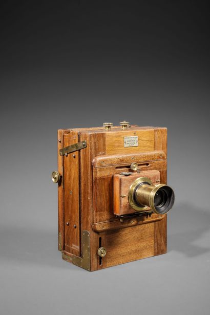 In the suitcase, two wooden view cameras....
