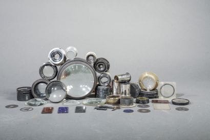 In a box, a set of various lenses and glass...