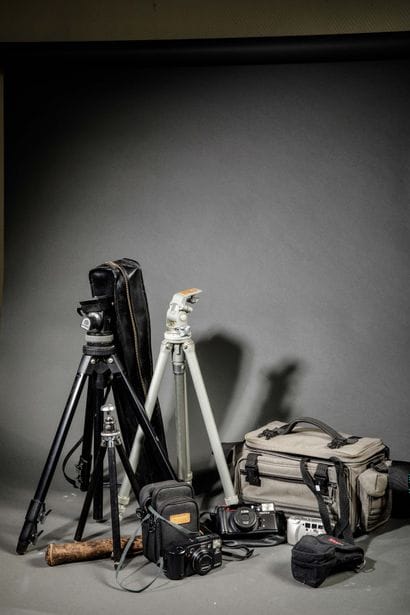 Assorted photography equipment. In a bag:...