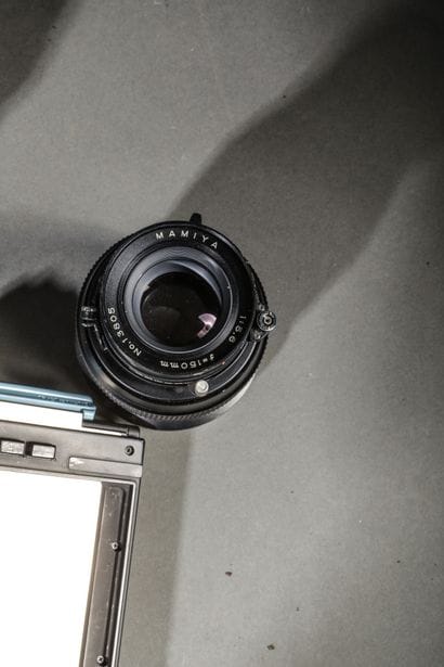 In the case: a Polaroid 600 SE camera with...