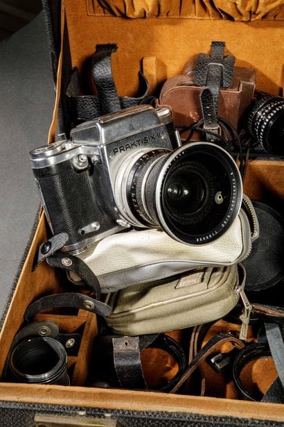 In a suitcase, a set of photographic equipment....