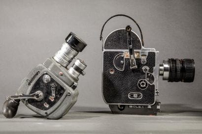 Set of two different cameras. 
Bolex camera...