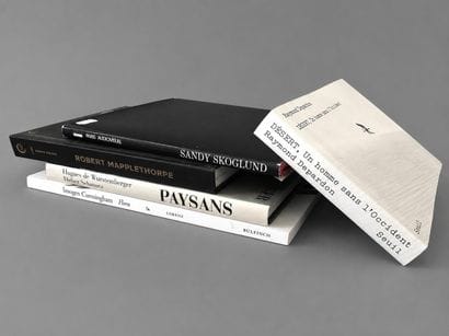 A set of five books on photography. 
“Robert...