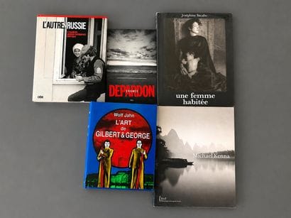 A set of five books on photography. 
Raymond...