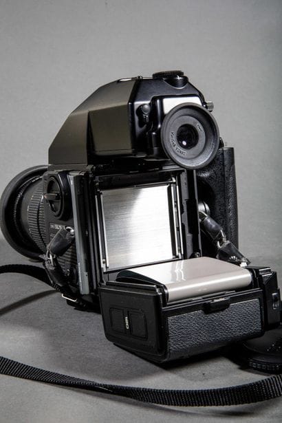 Set of two different cameras. 
Bolex camera...