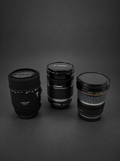 A set of six different lenses, including...