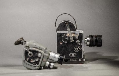 Set of two different cameras. 
Bolex camera...