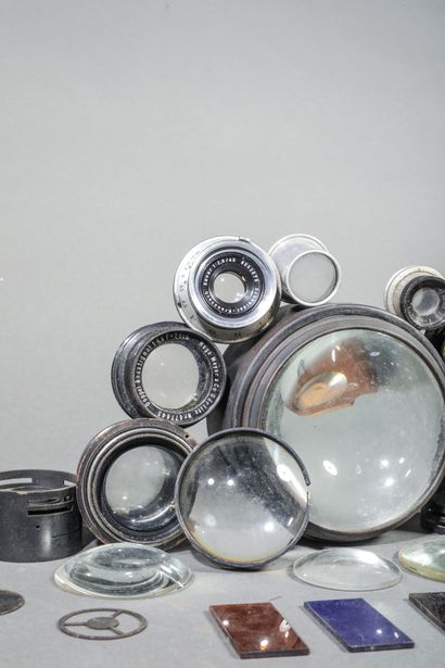 In a box, a set of various lenses and glass...
