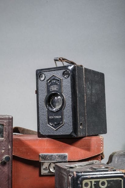 Set of three assorted cameras in their current...