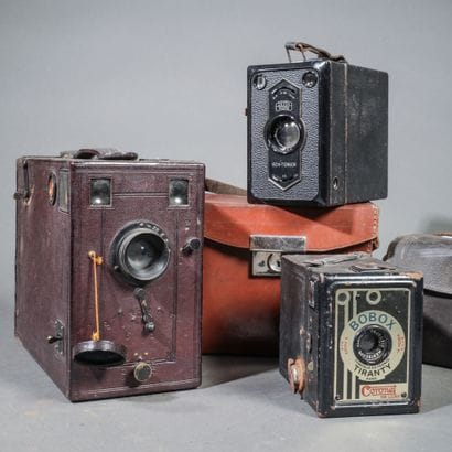 Set of three assorted cameras in their current...