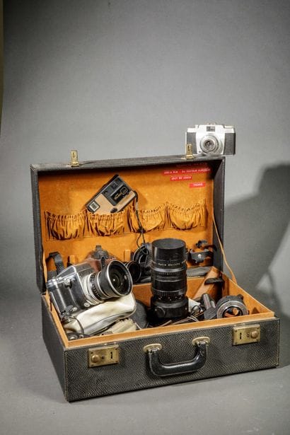 In a suitcase, a set of photographic equipment....