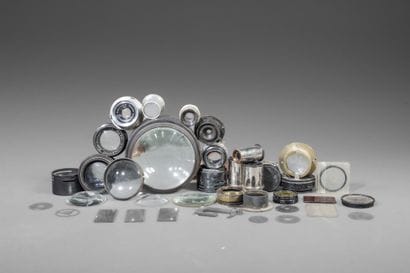 In a box, a set of various lenses and glass...