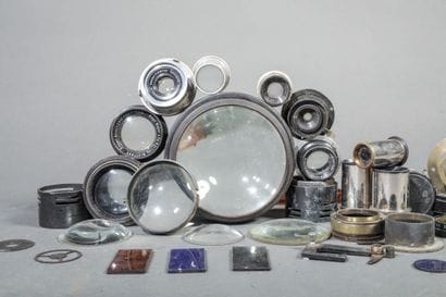 In a box, a set of various lenses and glass...