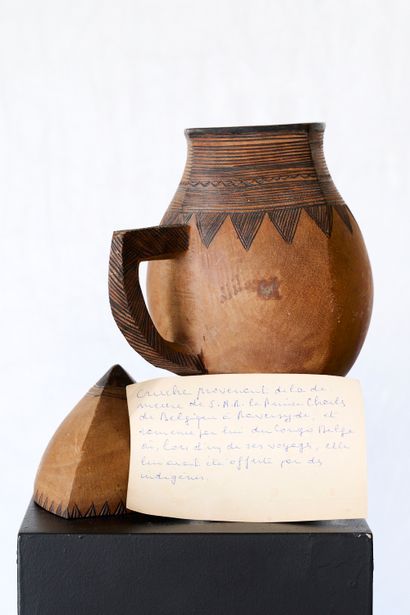CONGO or Rwanda
Monoxyl covered milk jug....