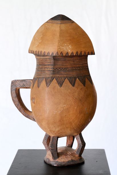 CONGO or Rwanda
Monoxyl covered milk jug....