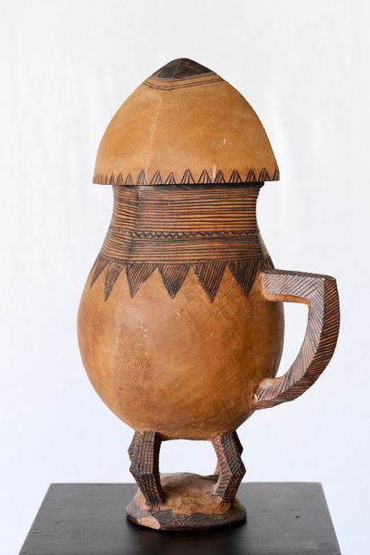 CONGO or Rwanda
Monoxyl covered milk jug....