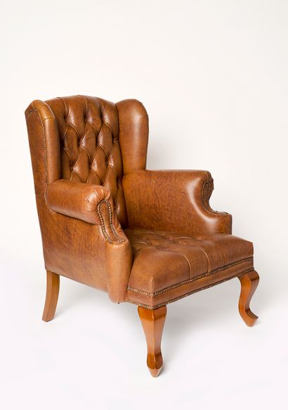 Fauteuil à oreille de style George I
Réplique...