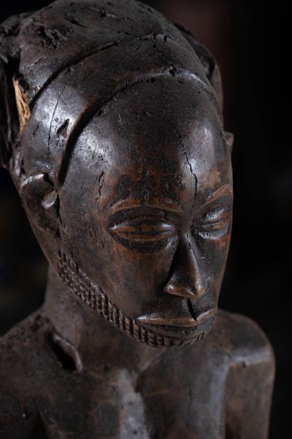 Hemba ethnic group, Congo.
Statute 