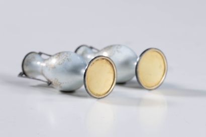 Guilloché enamel
Pair of small vases in white...
