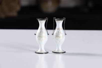 Guilloché enamel
Pair of small vases in white...