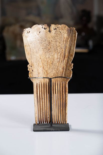 Antique carved bone comb. H.27.9 cm.